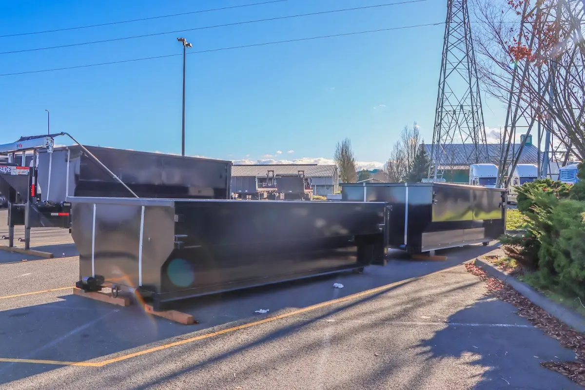 Roll-off dumpster ready for waste disposal at job site for 20 Yard Dumpster Rental in Craig